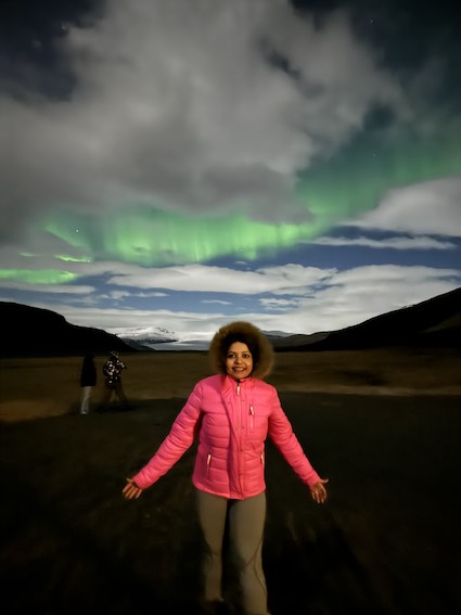 Nothern Lights visible through clouds in Iceland