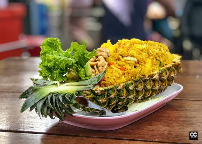 Mouthwatering pineapple fried rice is go to Thai street food